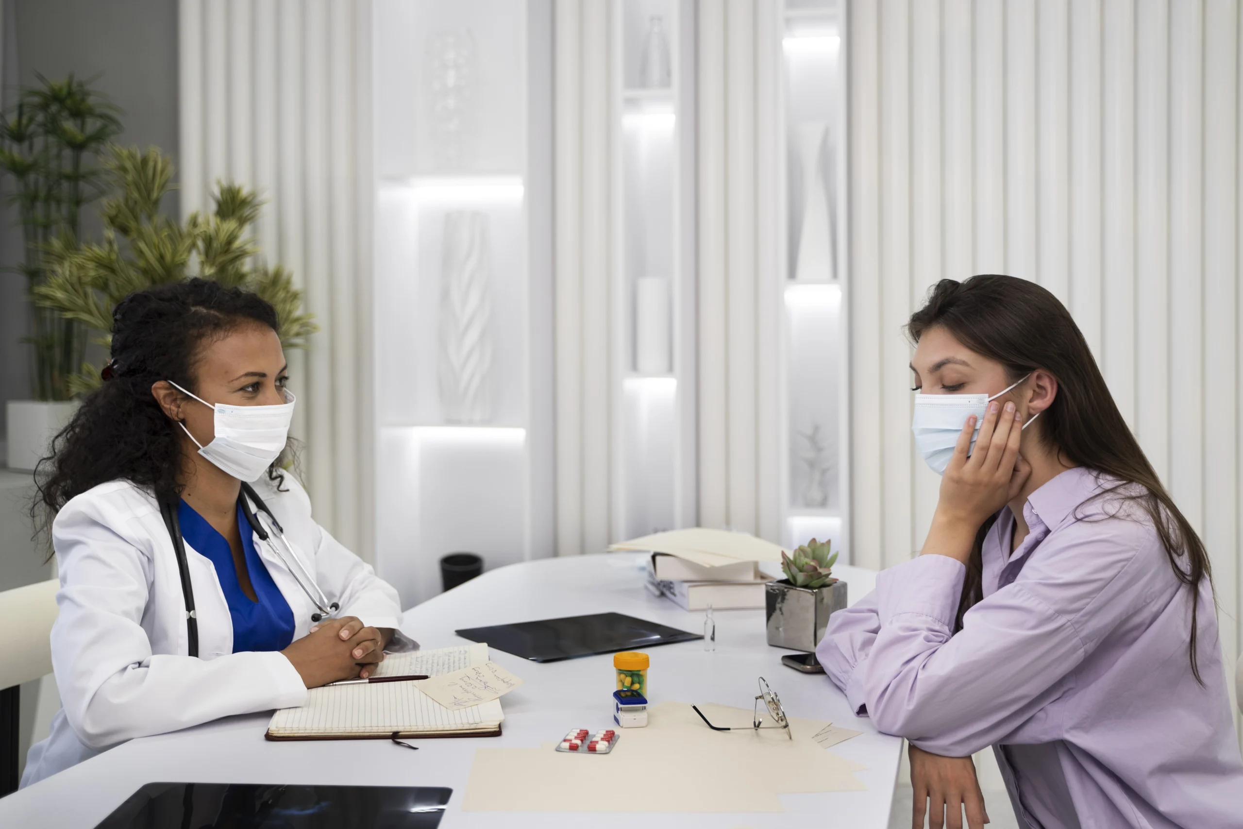 Urologist consulting female patient at Ashtavinayak Multispeciality Hospital, Panvel – personalized care and expert diagnosis in a safe, modern environment.