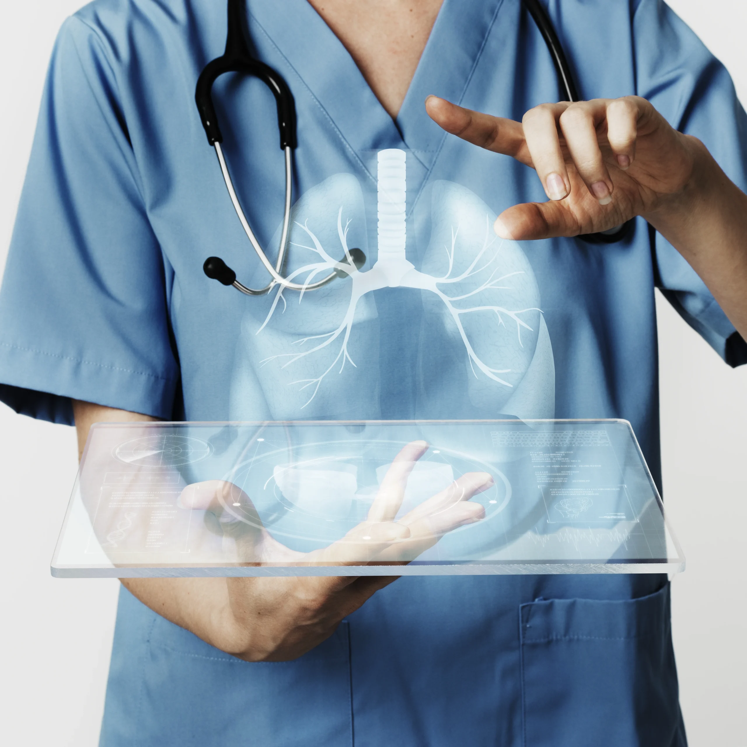 Doctor in blue scrubs with stethoscope pointing at a digital hologram of kidneys, representing nephrology and kidney health care.