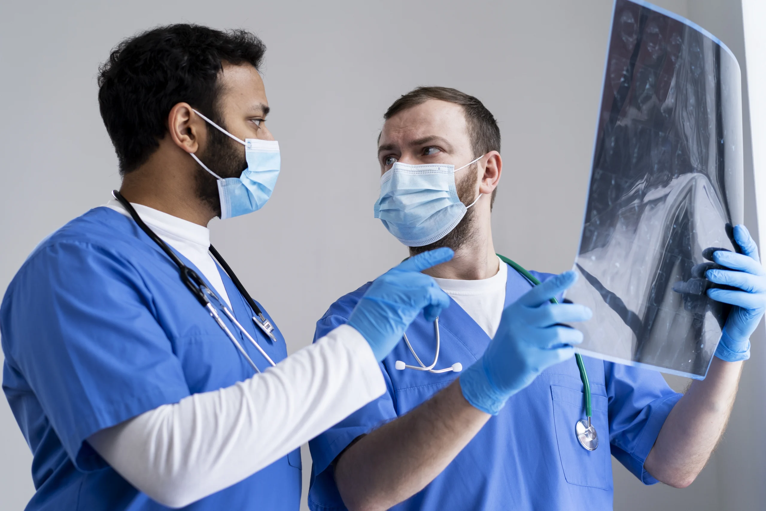 Surgeons reviewing hip X-ray – Expert hip replacement care at Ashtavinayak Hospital Panvel